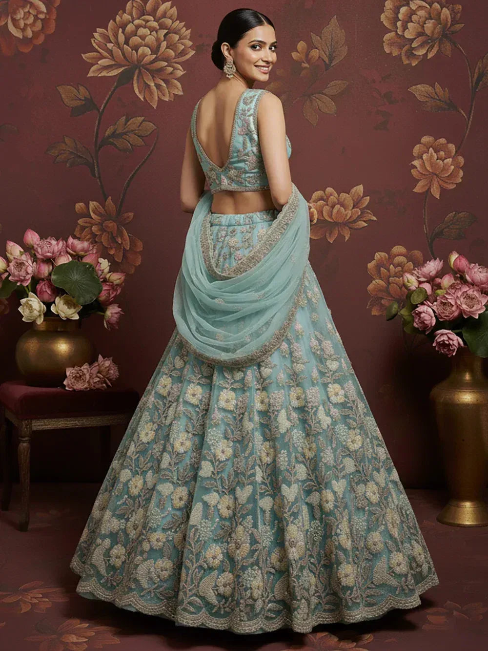 Elegant light blue lehenga choli with floral embroidery, perfect for Indian weddings and festive occasions