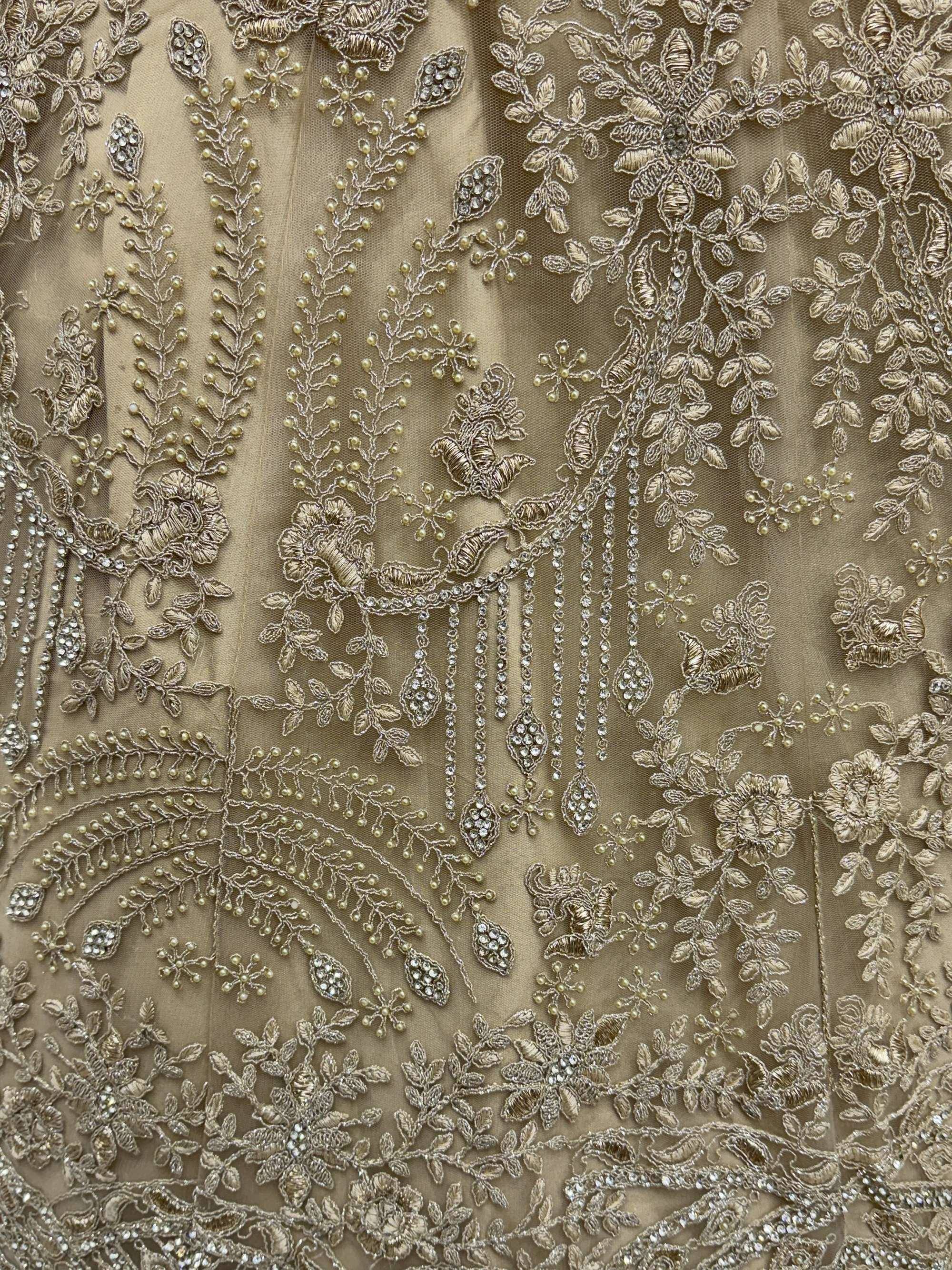 Fantastic Golden Thread Embroidered Net Engagement Wear Lehenga Choli