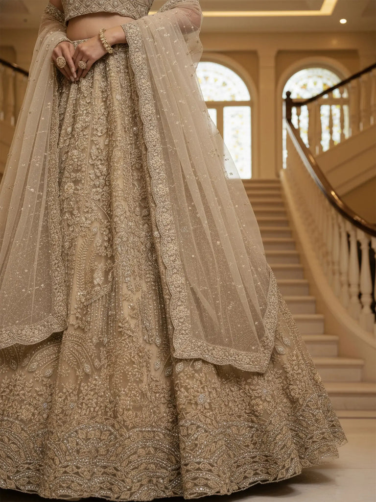 Fantastic Golden Thread Embroidered Net Engagement Wear Lehenga Choli