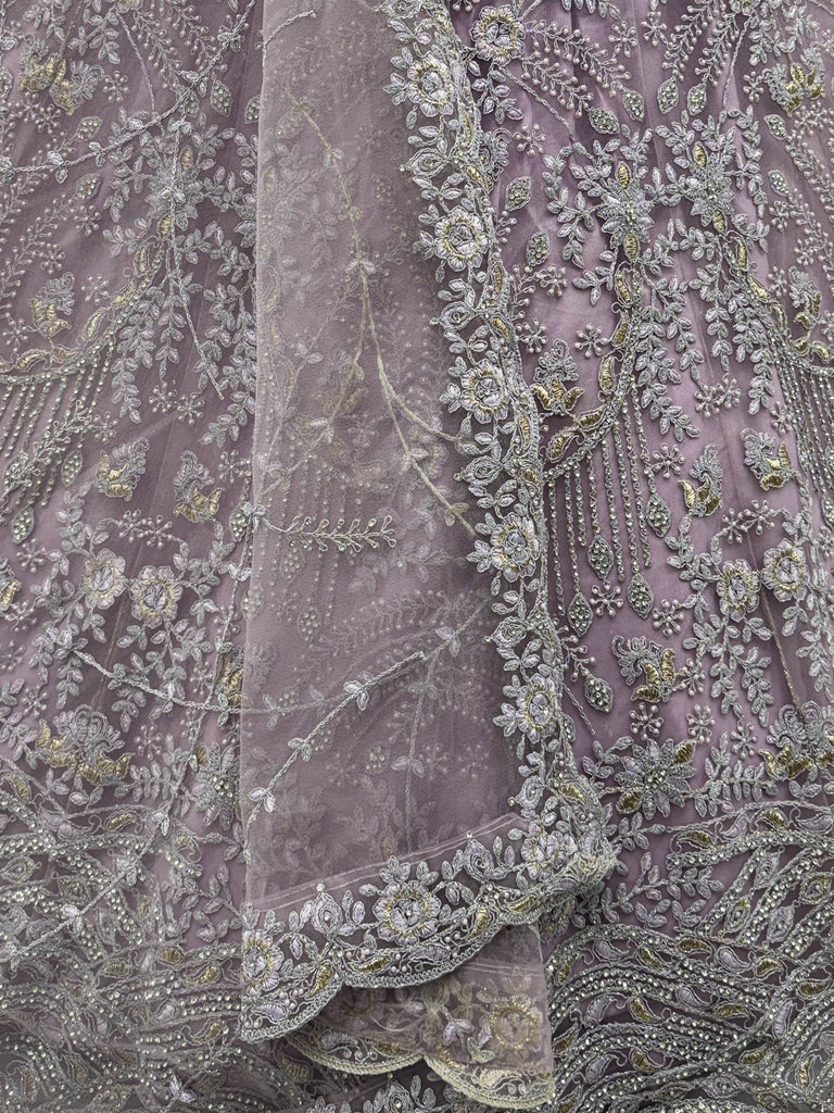 Amazing Lilac Thread Embroidered Net Party Wear Lehenga Choli