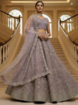 Amazing Lilac Thread Embroidered Net Party Wear Lehenga Choli