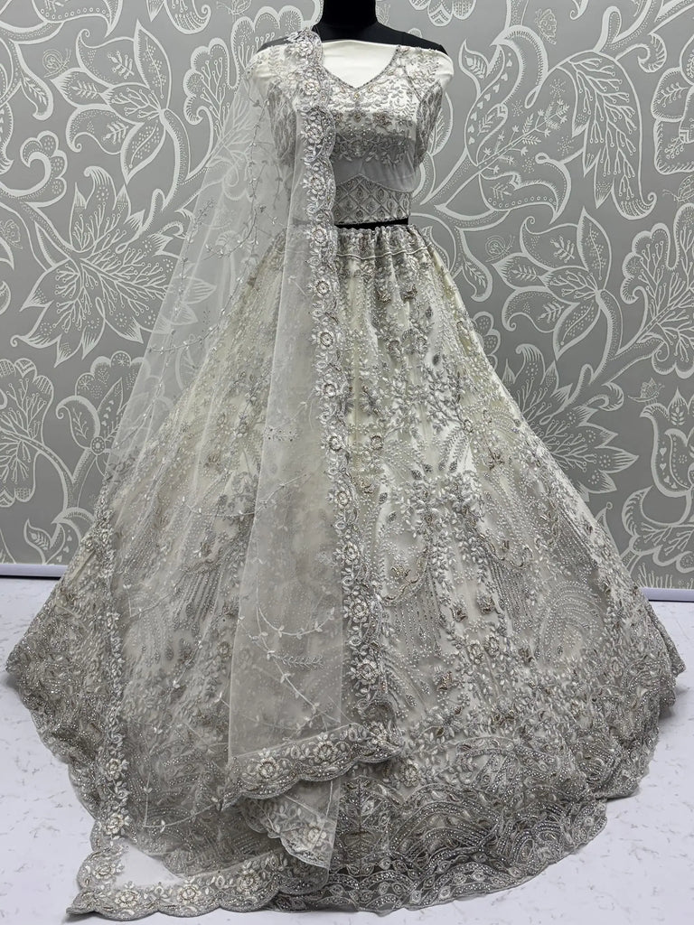 Awesome White Thread Embroidered Net Engagement Wear Lehenga Choli 