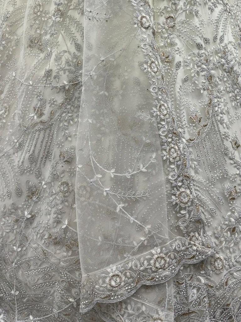 Awesome White Thread Embroidered Net Engagement Wear Lehenga Choli 