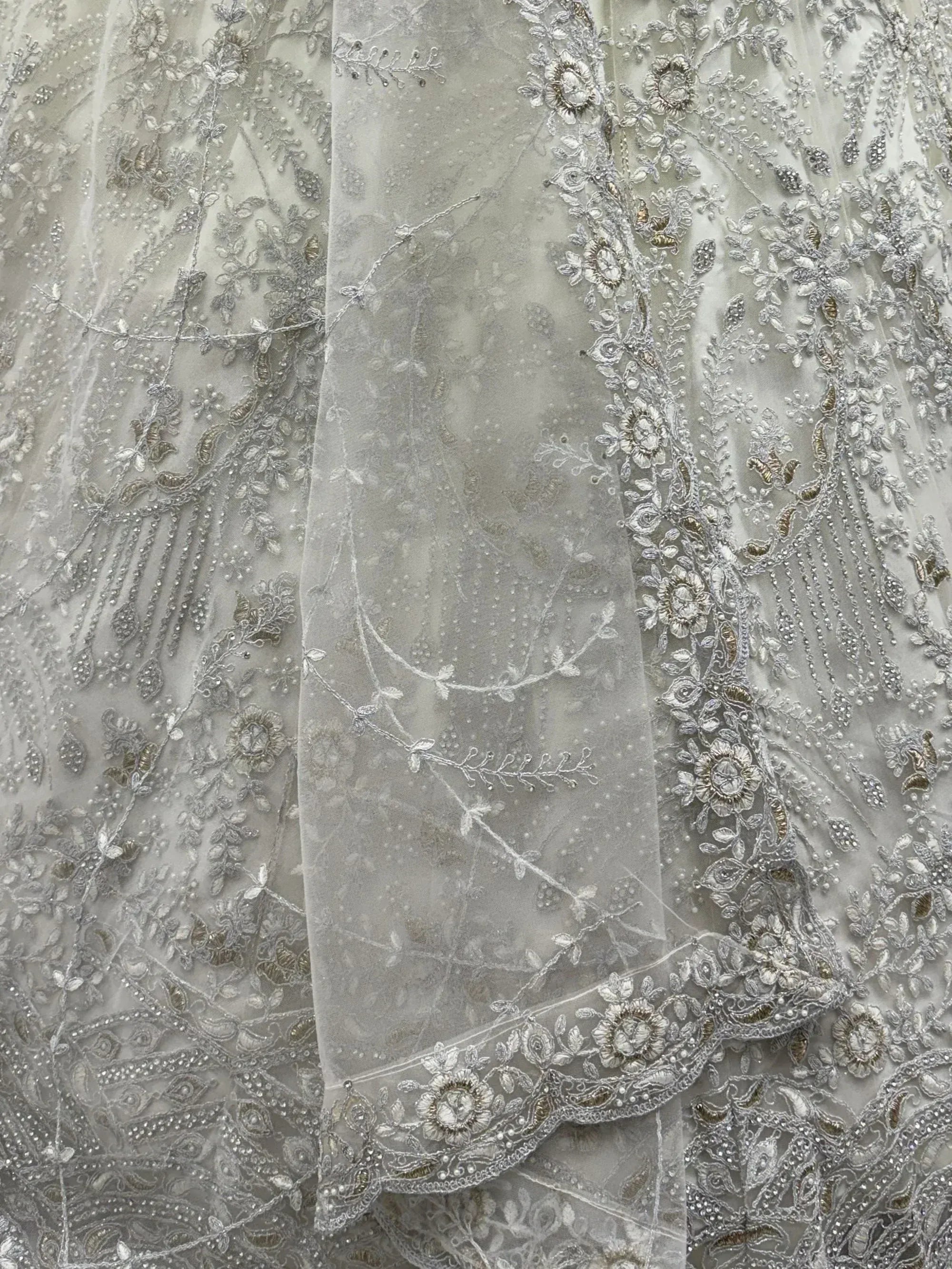 Awesome White Thread Embroidered Net Engagement Wear Lehenga Choli 