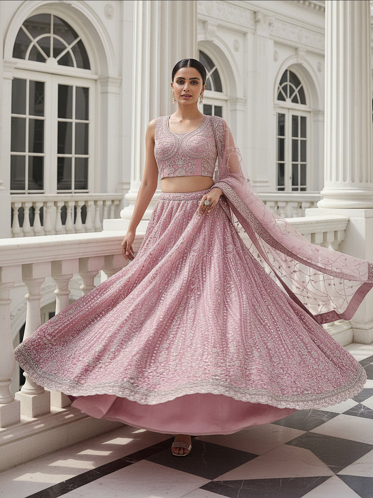 Adorable Peach Heavy Embroidered Net Reception Wear Lehenga Choli