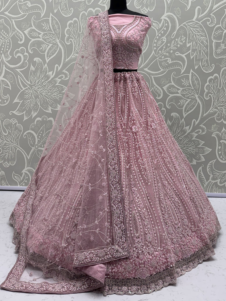 Adorable Peach Heavy Embroidered Net Reception Wear Lehenga Choli