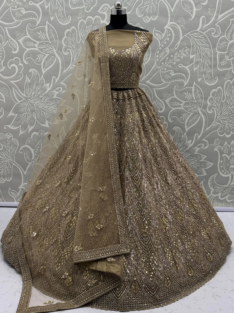 Wonderful Golden Sequins Embroidered Net Reception Wear Lehenga Choli