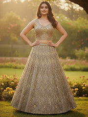 Wonderful Golden Sequins Embroidered Net Reception Wear Lehenga Choli