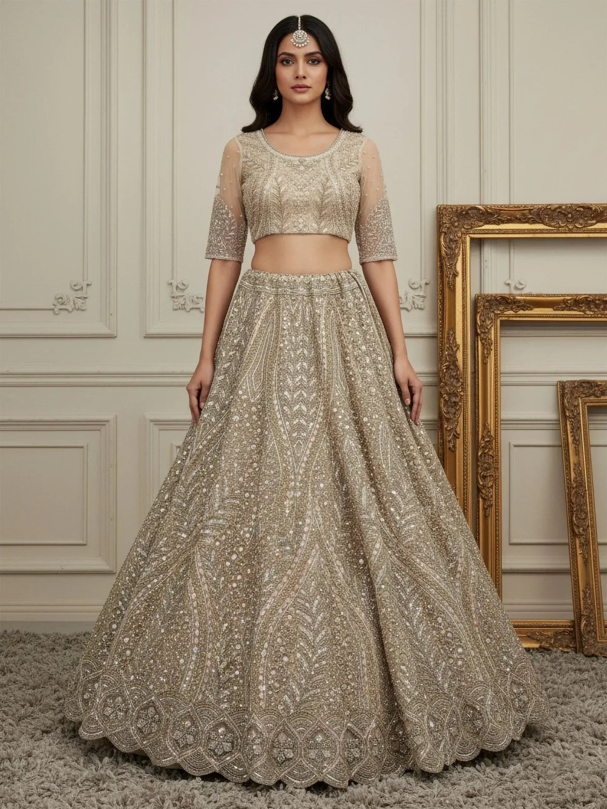 Elegant gold sequin lehenga choli with sheer sleeves, perfect for Indian weddings and festive occasions.