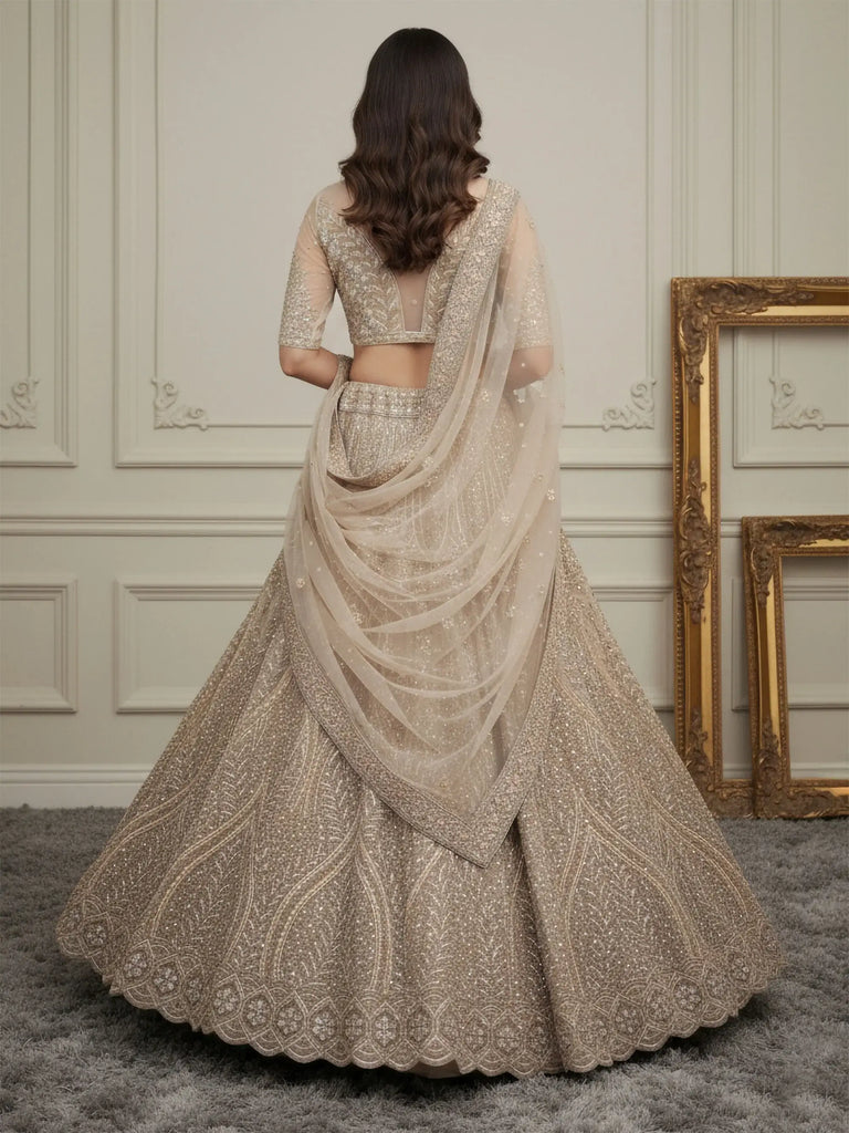 Beautiful Golden Diamond Work Net Reception Wear Lehenga Choli 