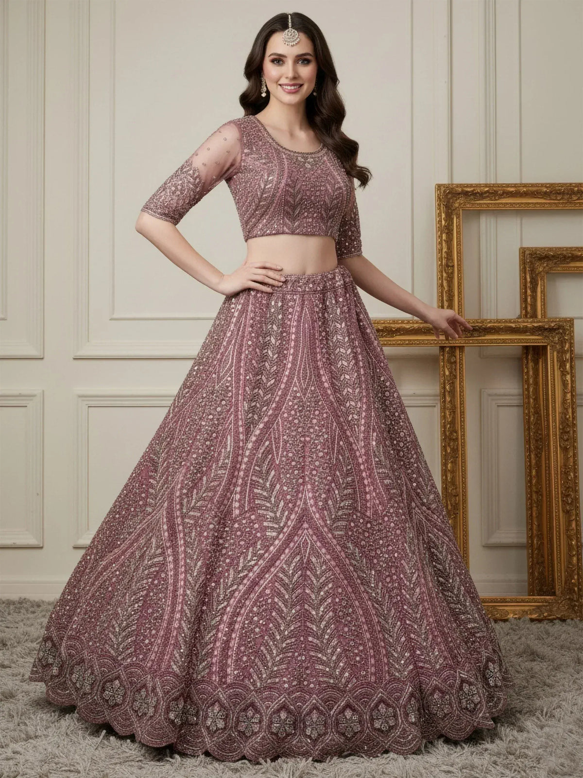 Elegant mauve designer lehenga choli with intricate embroidery and sequin work, perfect for Indian weddings and festive occasions.