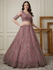 Alluring Pink Sequins Embroidered Net Engagement Wear Lehenga Choli 