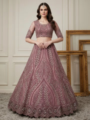 Alluring Pink Sequins Embroidered Net Engagement Wear Lehenga Choli 