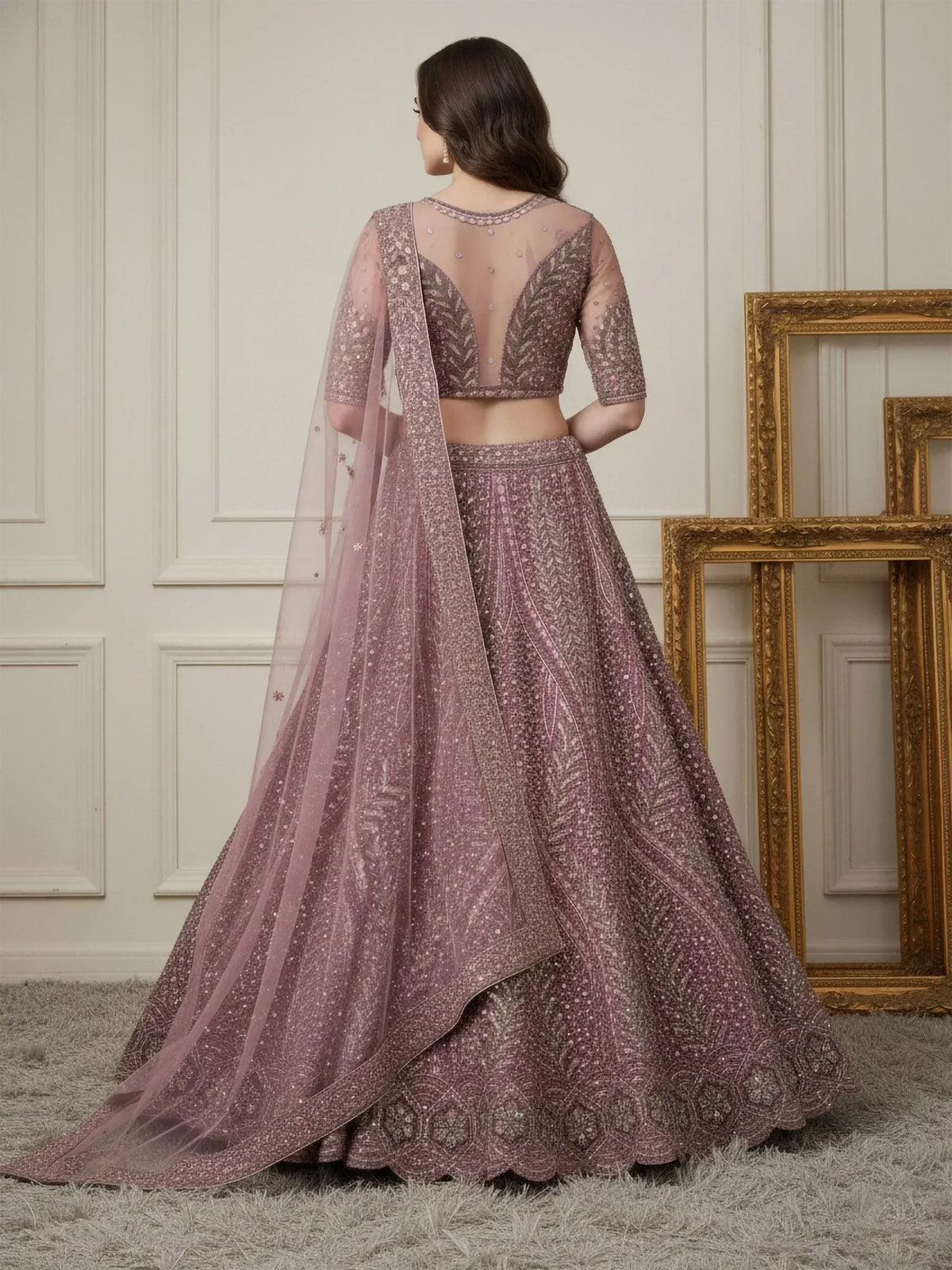 Elegant mauve lehenga choli with intricate embroidery and sheer dupatta, perfect for Indian weddings and festive occasions.