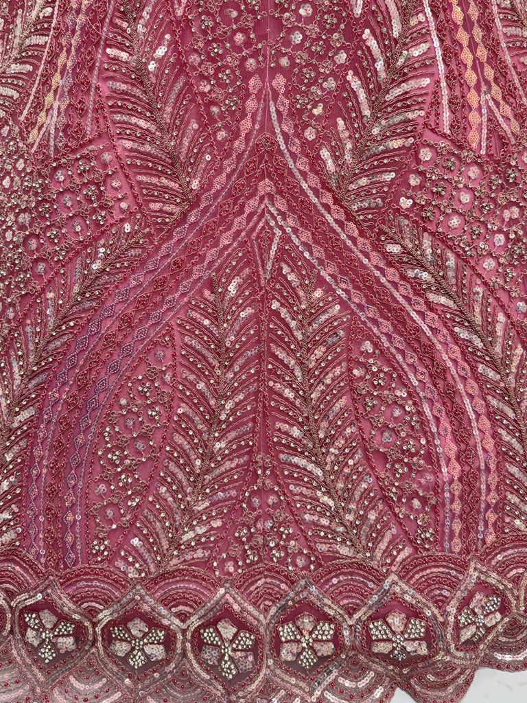 Alluring Pink Sequins Embroidered Net Engagement Wear Lehenga Choli 