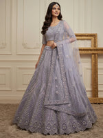 Wonderful Purple Sequins Embroidered Net Reception Wear Lehenga Choli