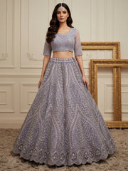 Wonderful Purple Sequins Embroidered Net Reception Wear Lehenga Choli 