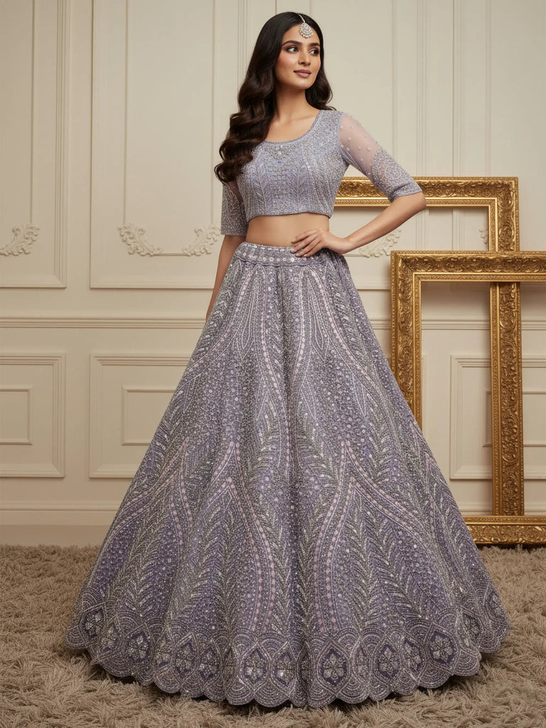 Wonderful Purple Sequins Embroidered Net Reception Wear Lehenga Choli 