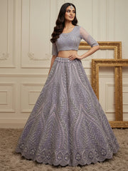 Wonderful Purple Sequins Embroidered Net Reception Wear Lehenga Choli 