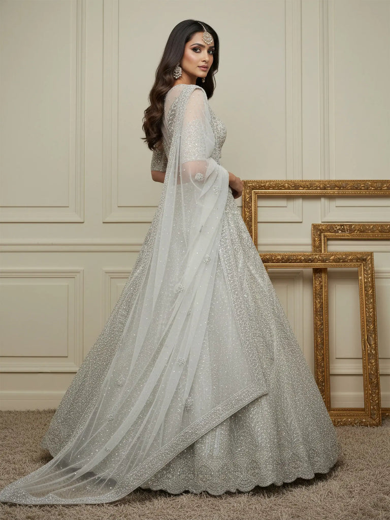 Precious Off-White Dori Embroidered Net Engagement Wear Lehenga Choli 