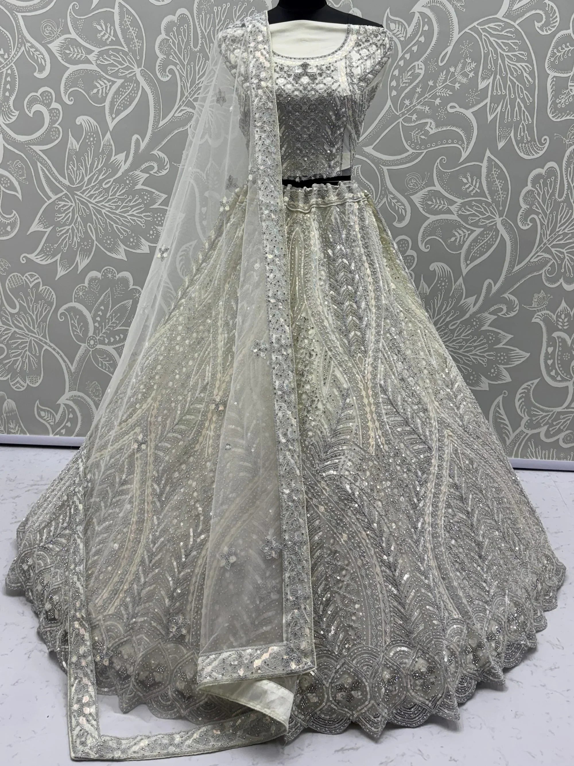 Precious Off-White Dori Embroidered Net Engagement Wear Lehenga Choli 
