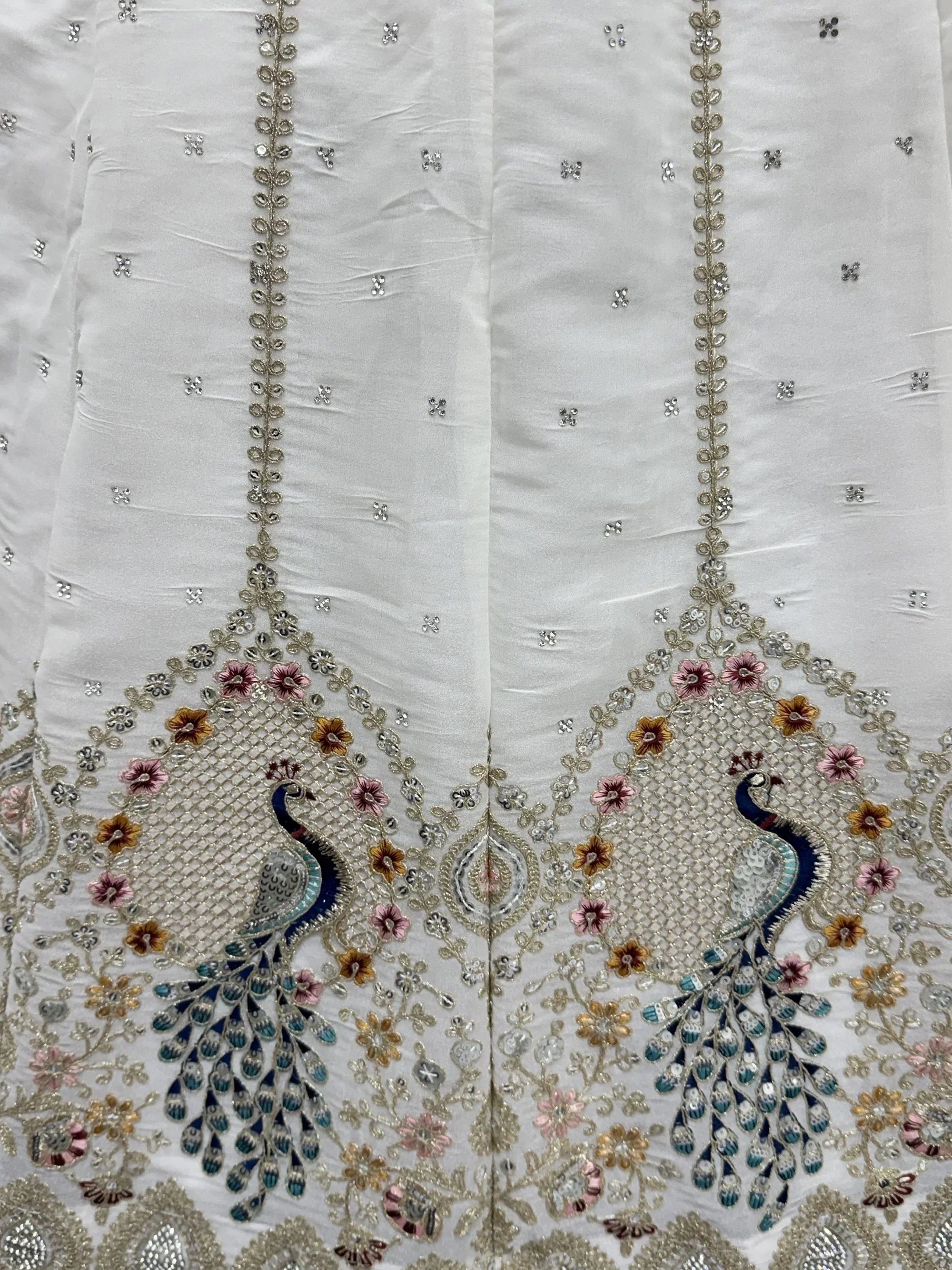 Glowing White Sequins Embroidered Silk Reception Wear Lehenga Choli