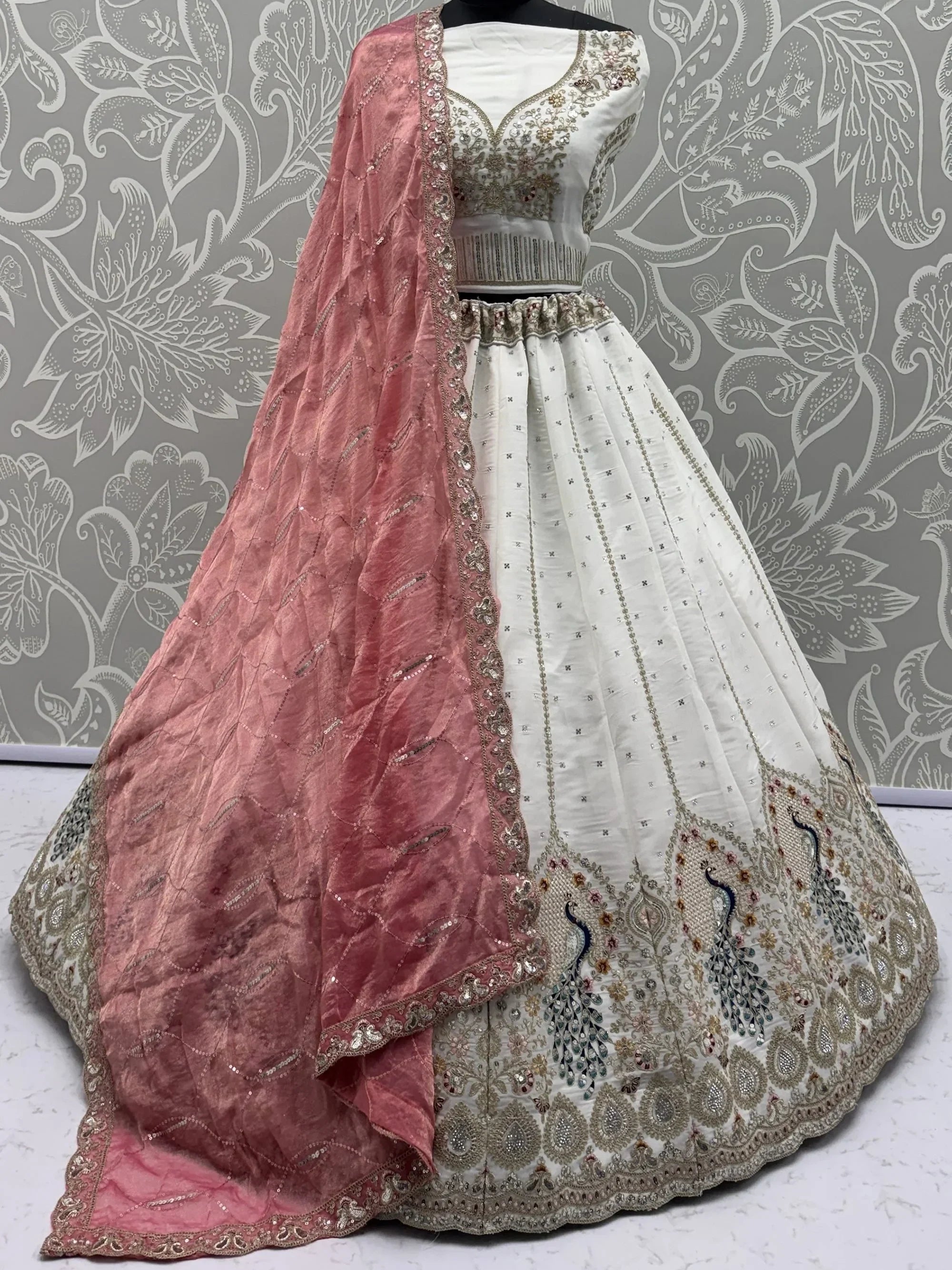 Glowing White Sequins Embroidered Silk Reception Wear Lehenga Choli