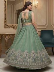 Beautiful Green Sequins Embroidered Silk Engagement Wear Lehenga Choli