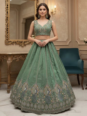 Beautiful Green Sequins Embroidered Silk Engagement Wear Lehenga Choli