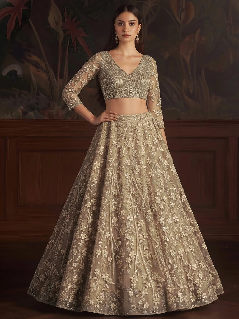 Alluring Golden Sequins Embroidered Net Reception Wear Lehenga Choli