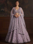 Graceful Purple Sequins Embroidered Net Reception Wear Lehenga Choli