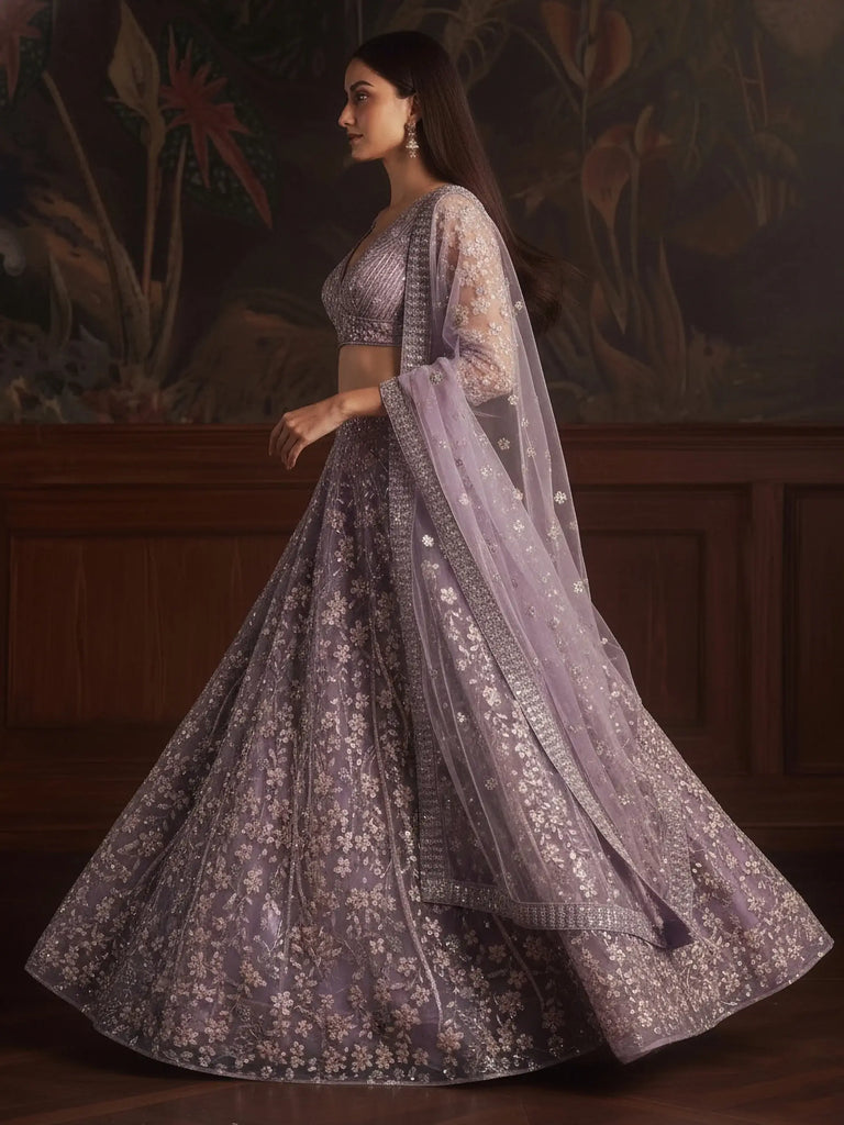Graceful Purple Sequins Embroidered Net Reception Wear Lehenga Choli