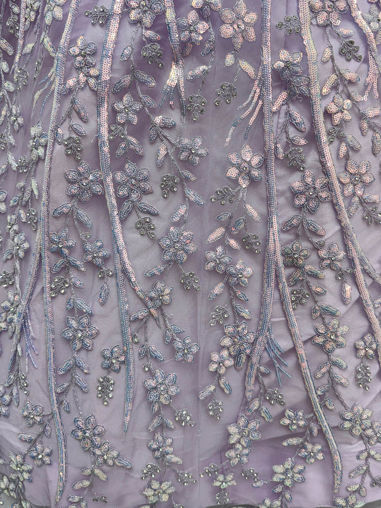 Graceful Purple Sequins Embroidered Net Reception Wear Lehenga Choli
