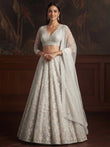 Beautiful White Sequins Embroidered Net Reception Wear Lehenga Choli