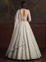 Beautiful White Sequins Embroidered Net Reception Wear Lehenga Choli