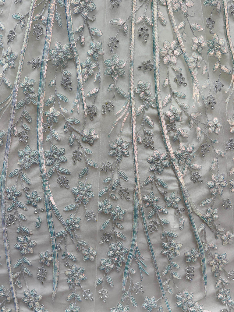 Beautiful White Sequins Embroidered Net Reception Wear Lehenga Choli