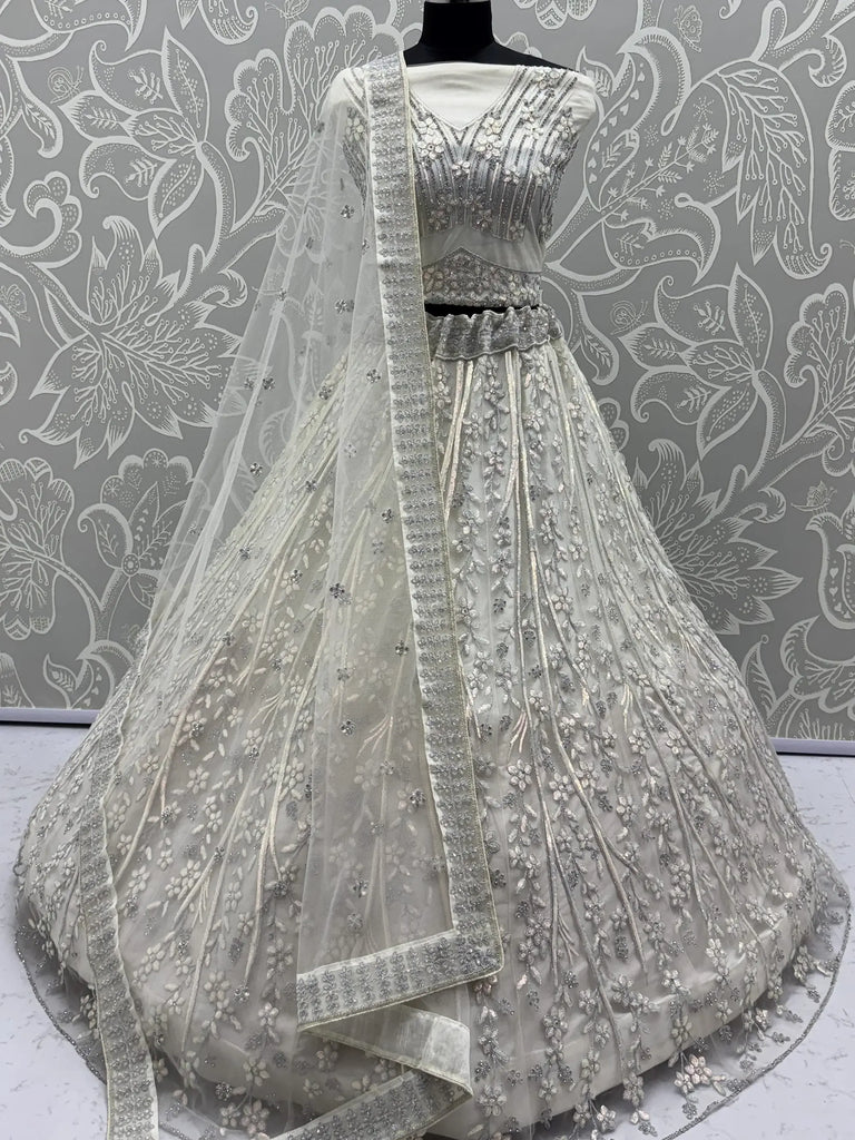 Beautiful White Sequins Embroidered Net Reception Wear Lehenga Choli