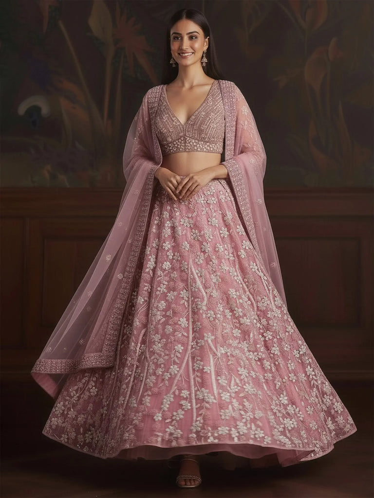 Stunning Pink Sequins Embroidered Net Engagement Wear Lehenga Choli