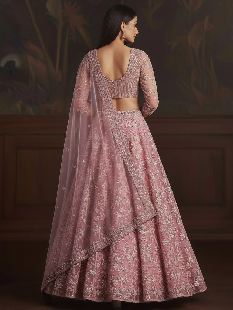 Stunning Pink Sequins Embroidered Net Engagement Wear Lehenga Choli