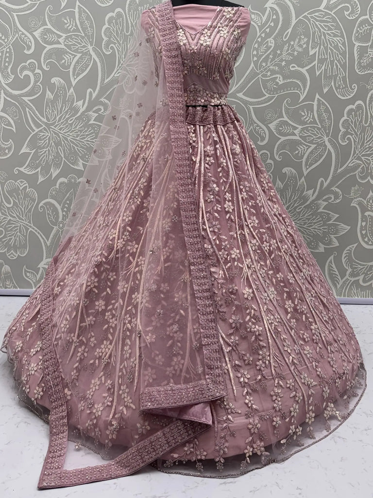 Stunning Pink Sequins Embroidered Net Engagement Wear Lehenga Choli