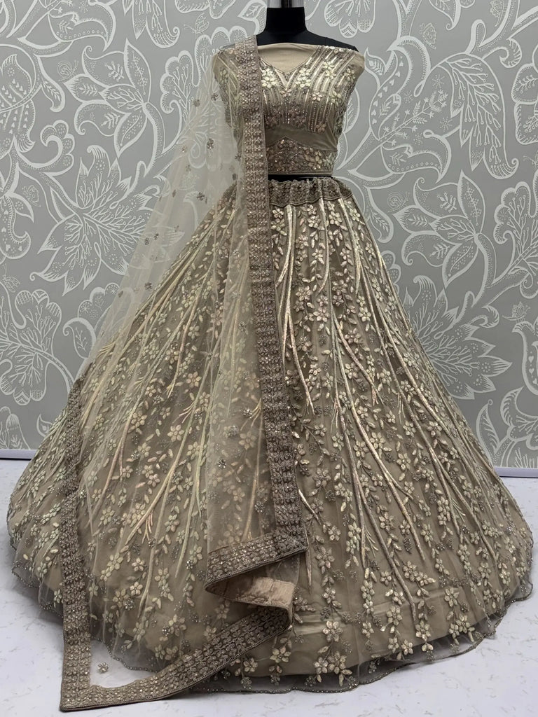 Alluring Golden Sequins Embroidered Net Reception Wear Lehenga Choli