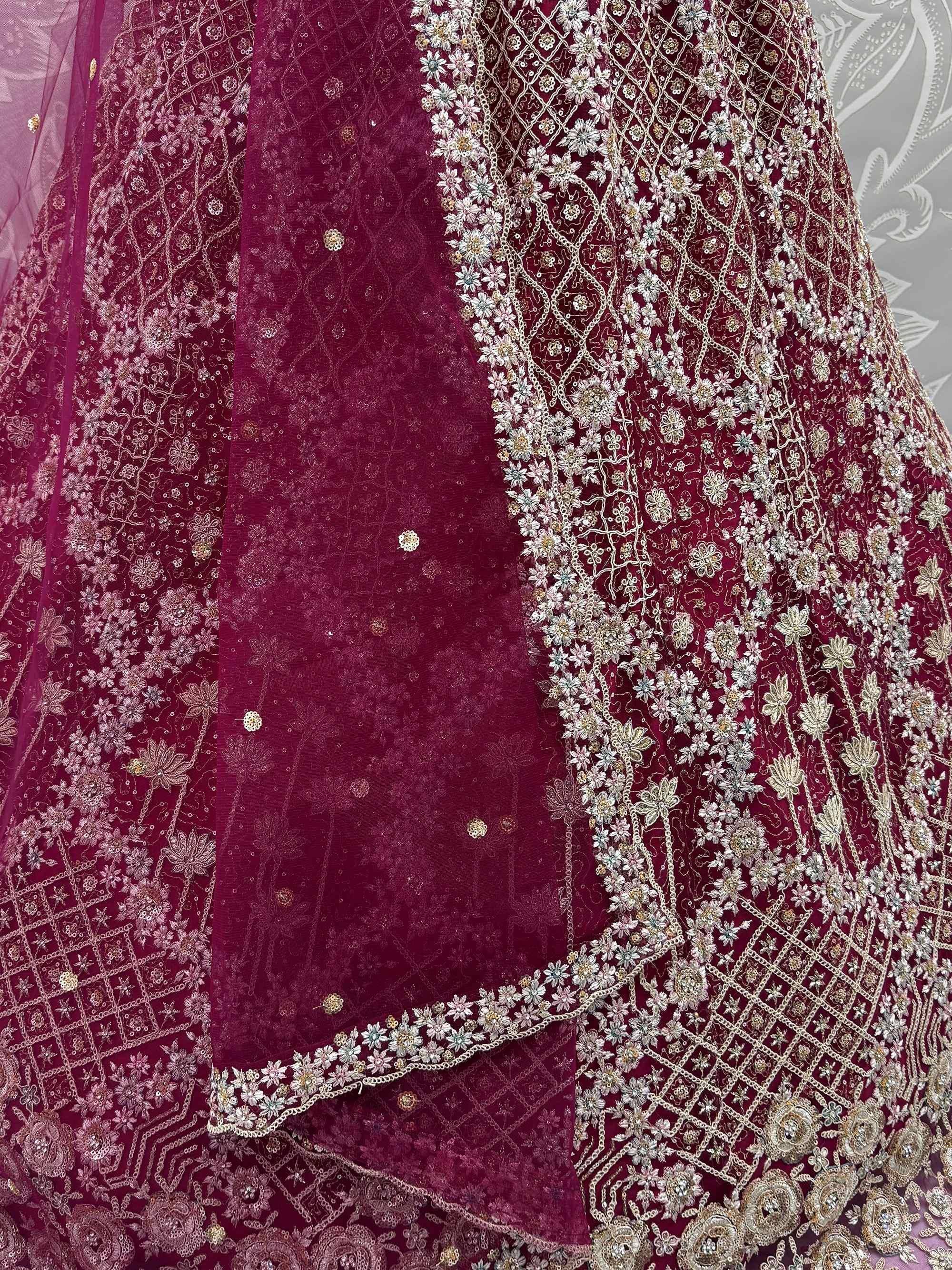 Maroon designer lehenga with intricate floral embroidery and embellishments