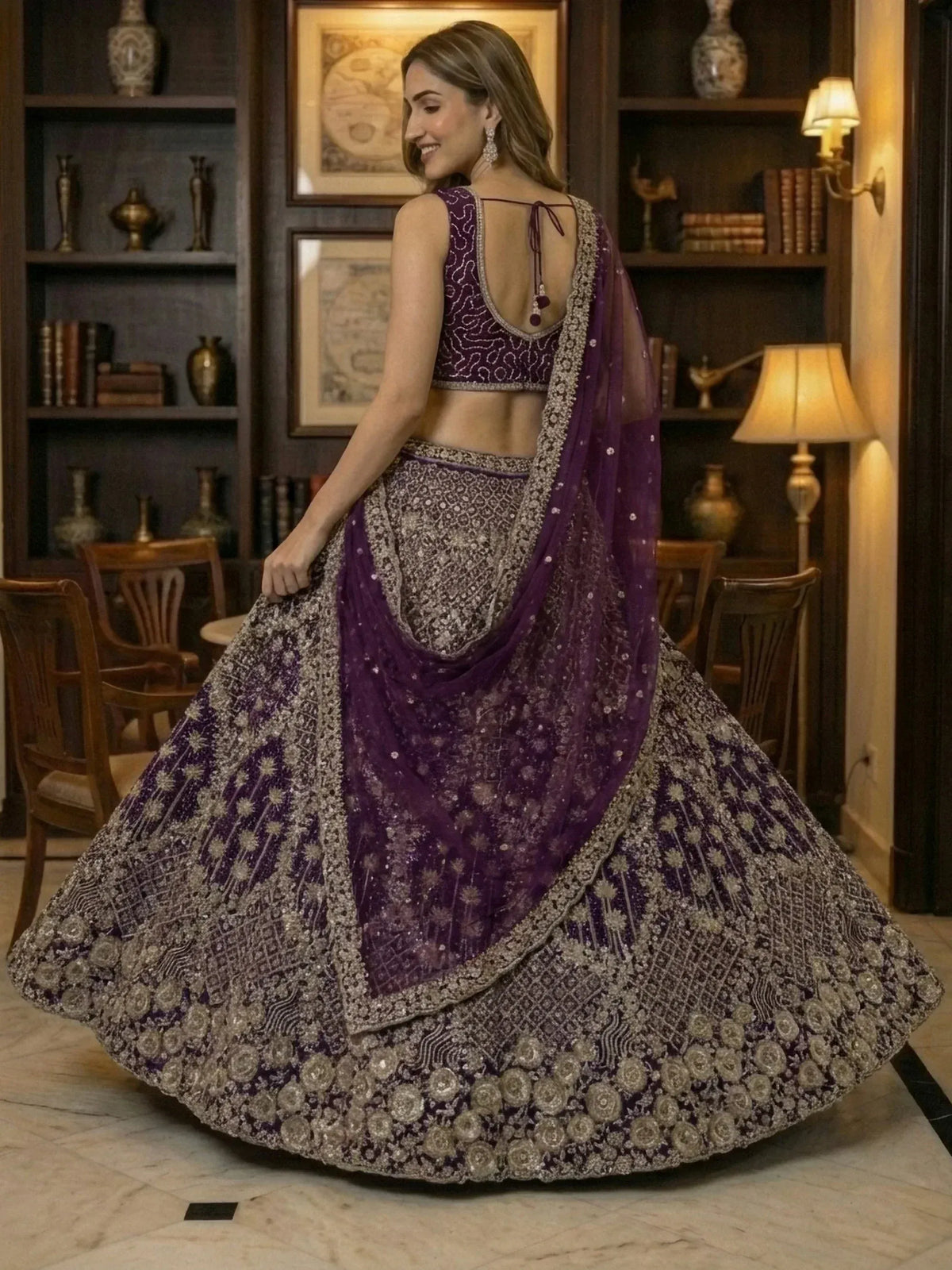 Elegant purple lehenga choli with intricate embroidery and sequin detailing for festive occasions