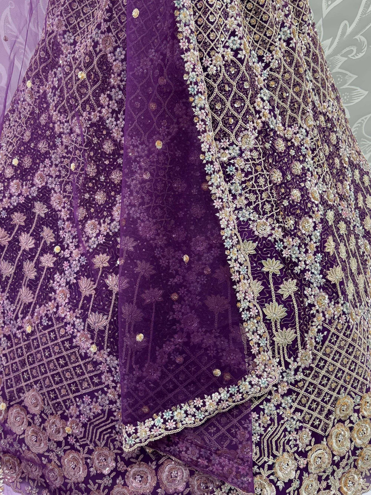 Purple embroidered lehenga with floral zari work and sequins, perfect for Indian ethnic wear