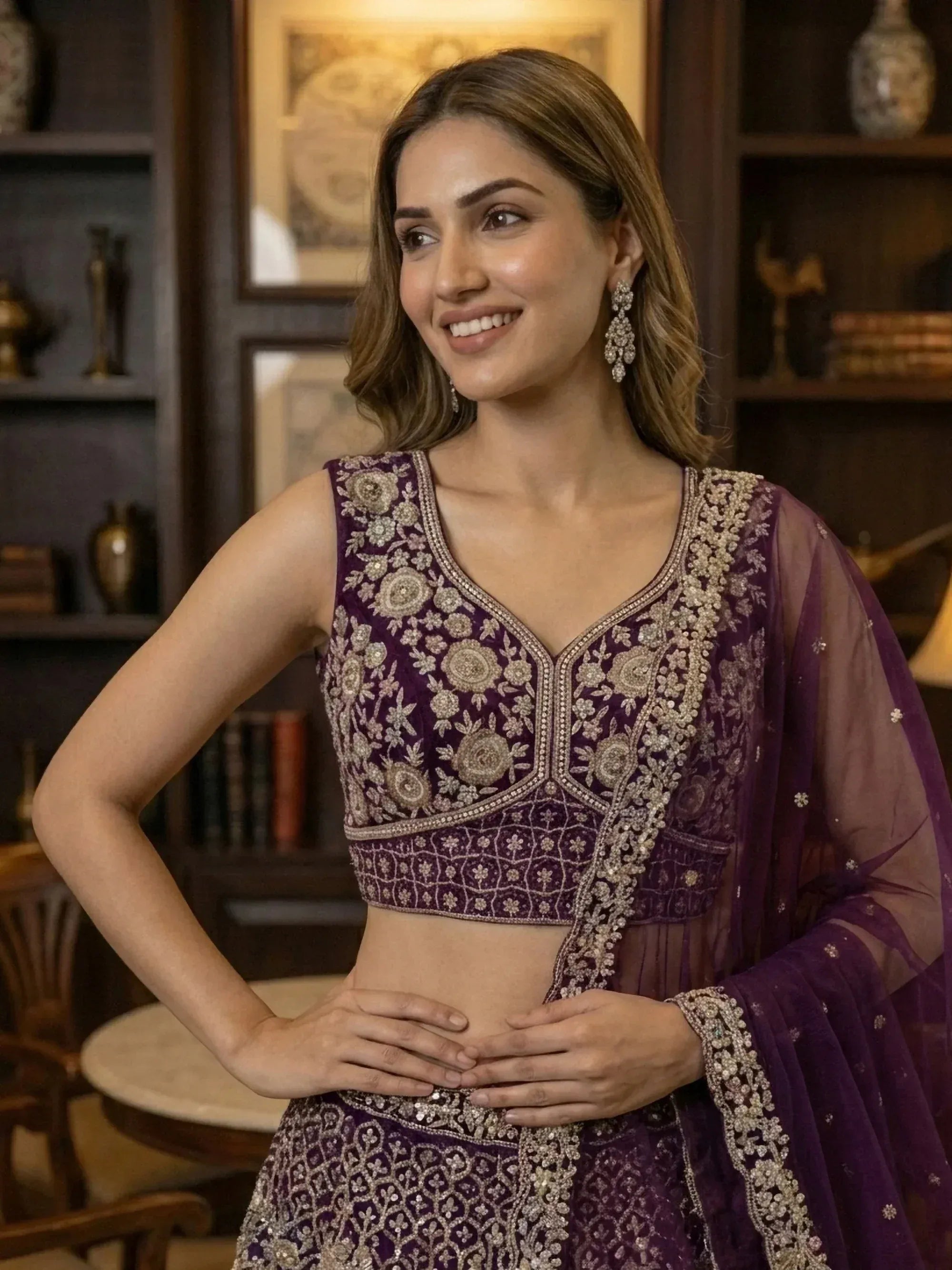 Elegant purple embroidered lehenga choli with floral designs and sheer dupatta