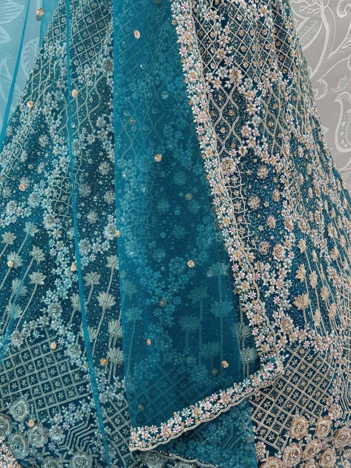 Teal embroidered lehenga with floral zari work and sequin detailing for Indian ethnic wear