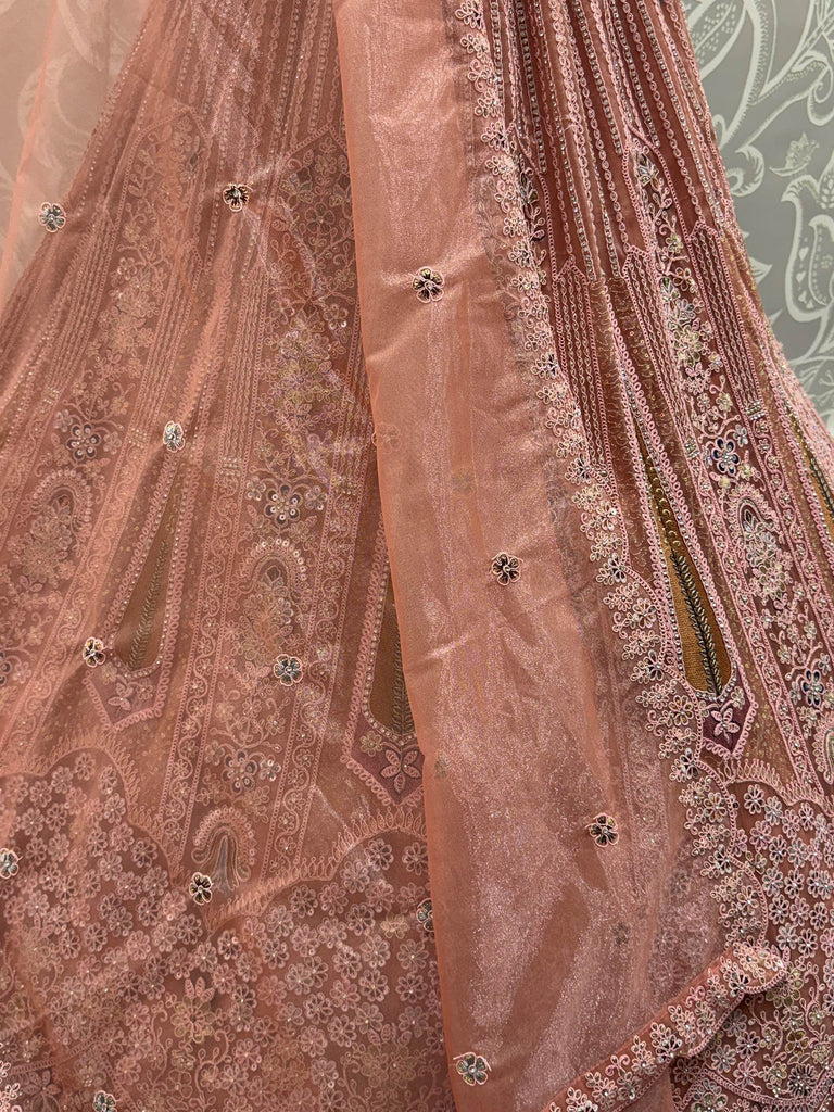 Glamorous Peach Dori Embroidered Net Wedding Wear Lehenga Choli