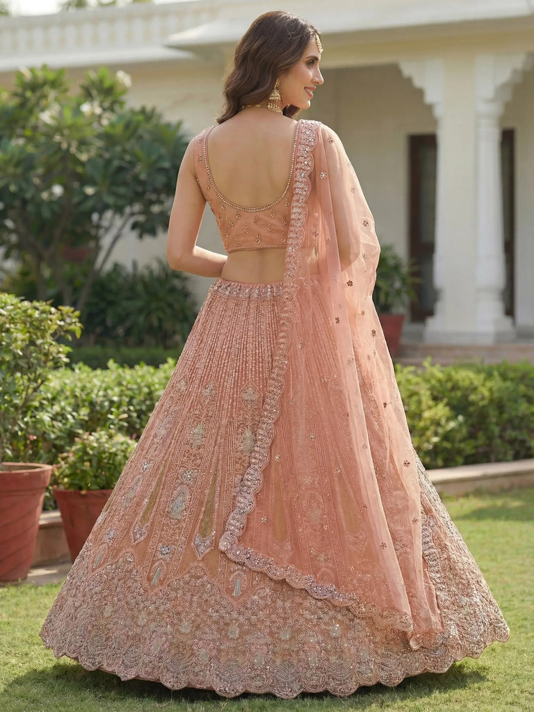 Glamorous Peach Dori Embroidered Net Wedding Wear Lehenga Choli