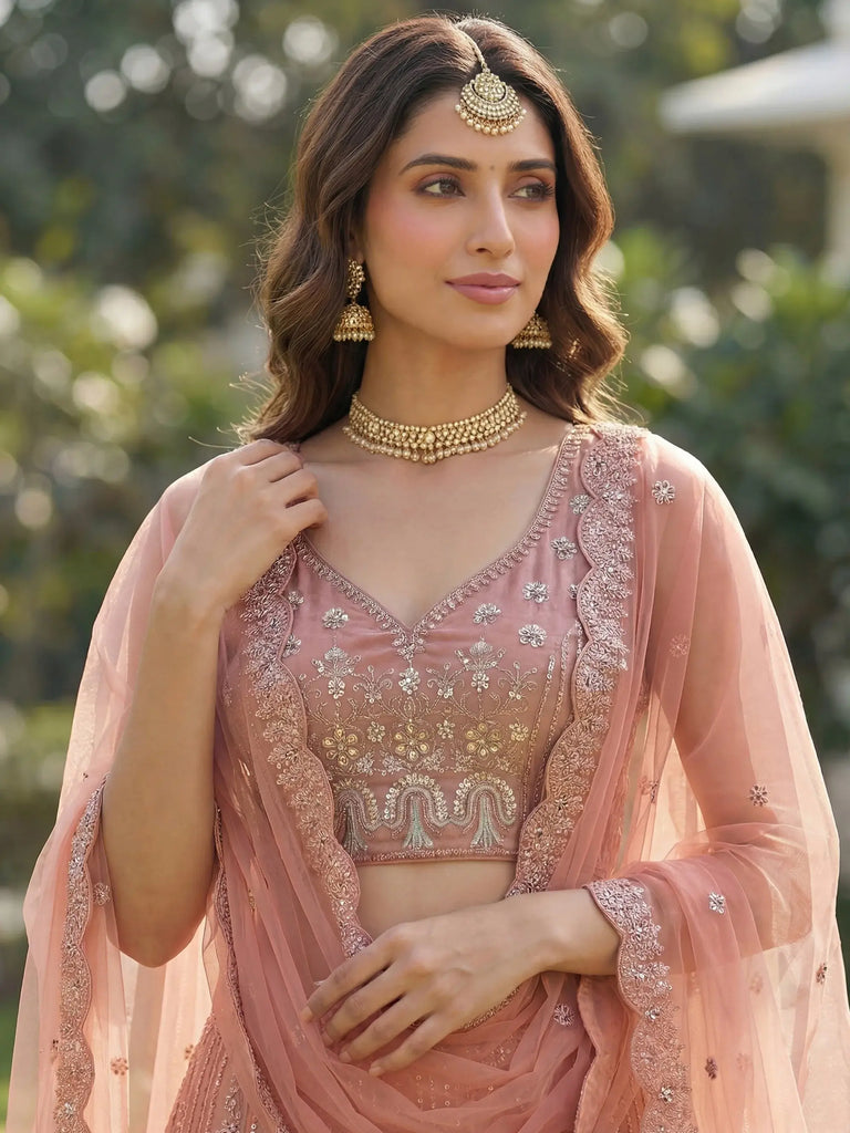 Glamorous Peach Dori Embroidered Net Wedding Wear Lehenga Choli