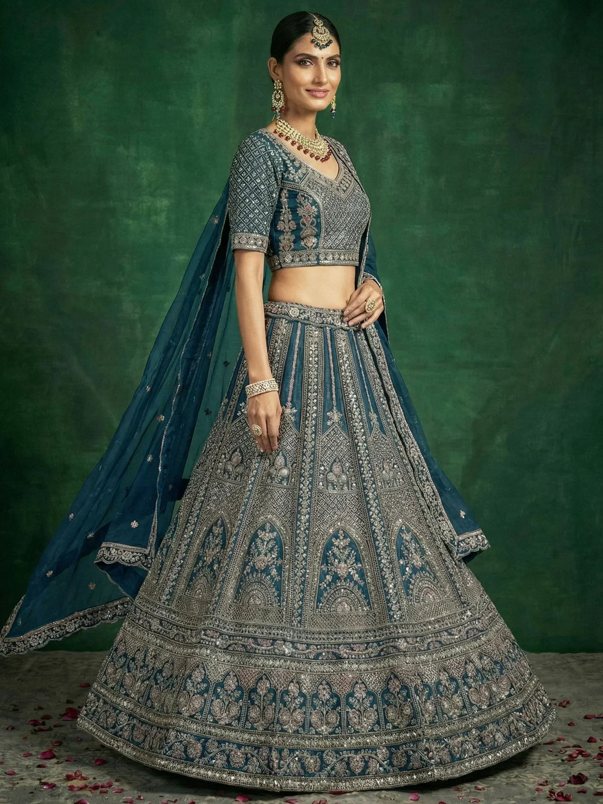 Elegant blue lehenga choli with intricate silver embroidery and matching dupatta for Indian ethnic wear